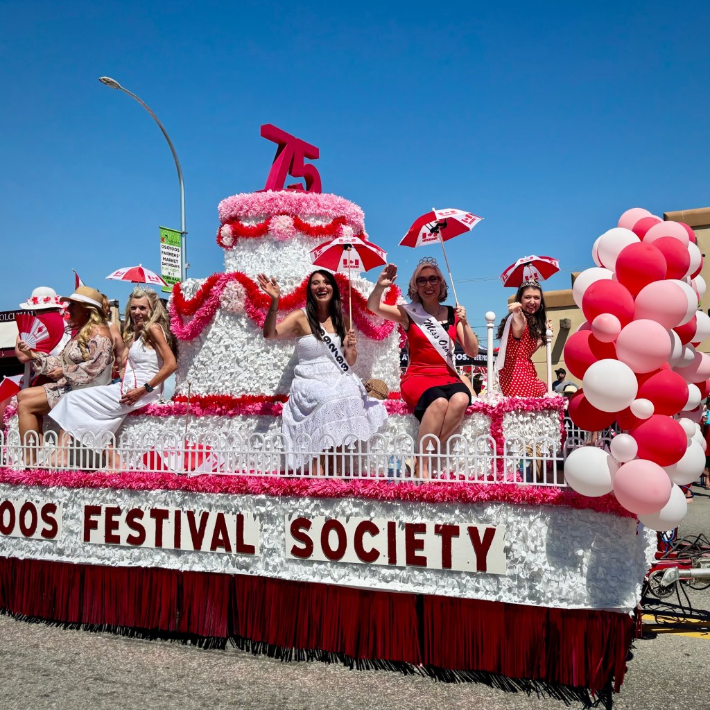 Past Osoyoos Ambassadors on the 75th anniversary float.