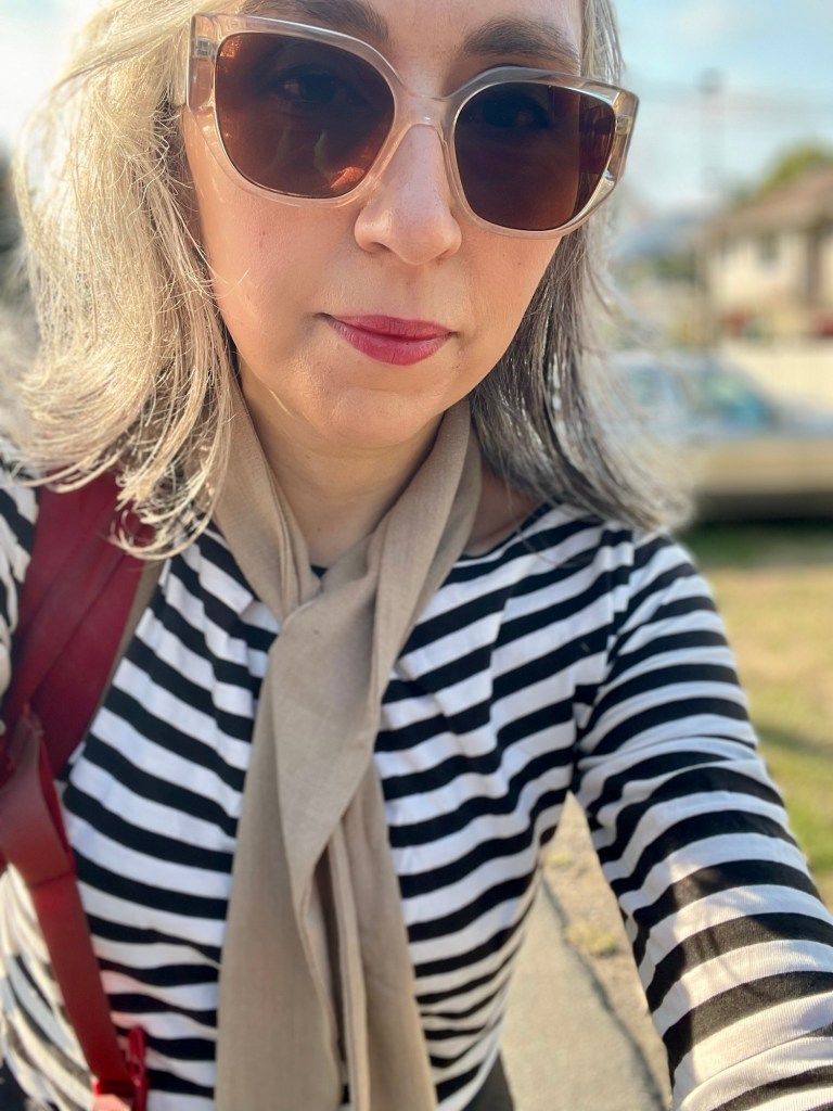 Author Sonia Nicholson wearing Ambrose Scarf by Vestige Story. 