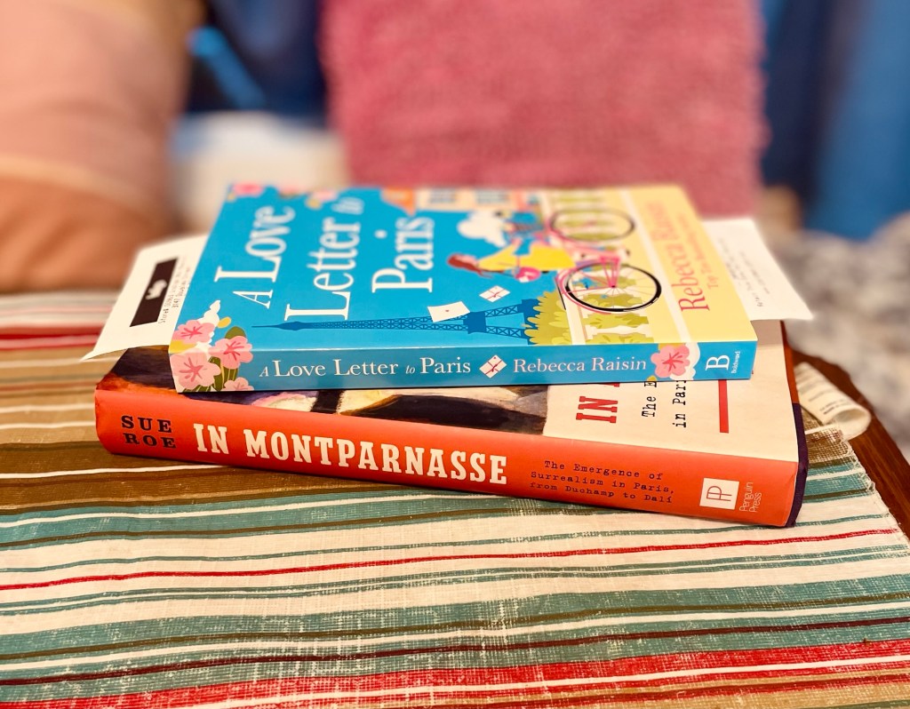 Stack of two books: A Love Letter to Paris, by Rebecca Raisin; and In. Montparnasse, by Sue Roe. Photo by Sonia Nicholson. 