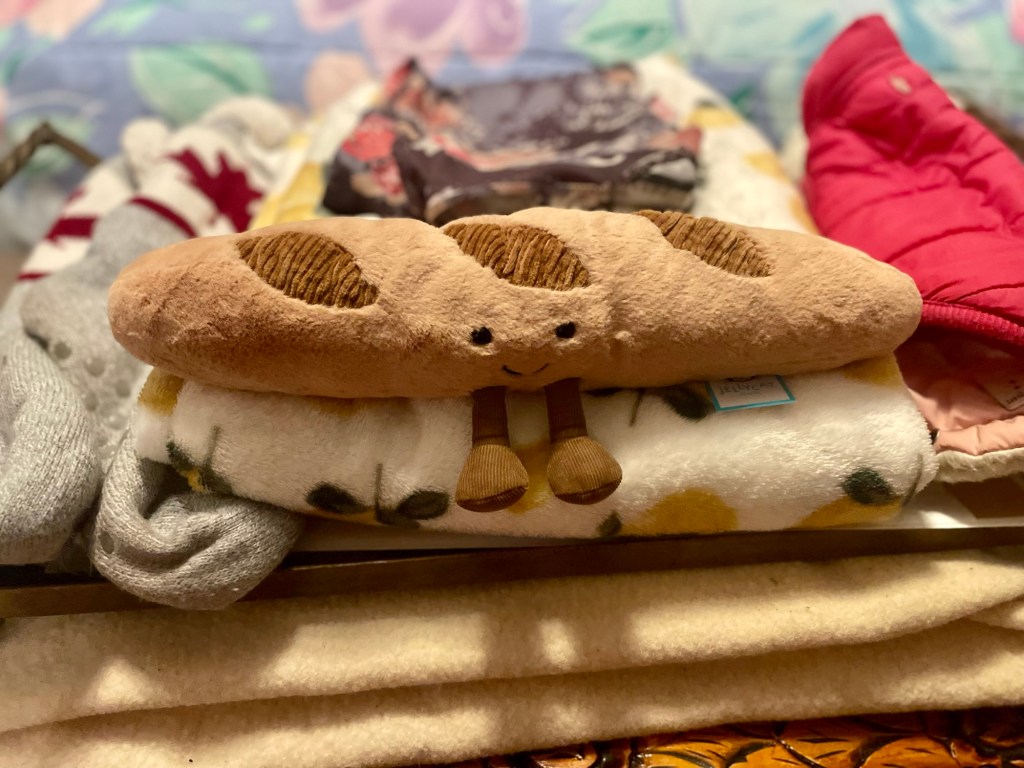 Jellycat baguette stuffed toy.