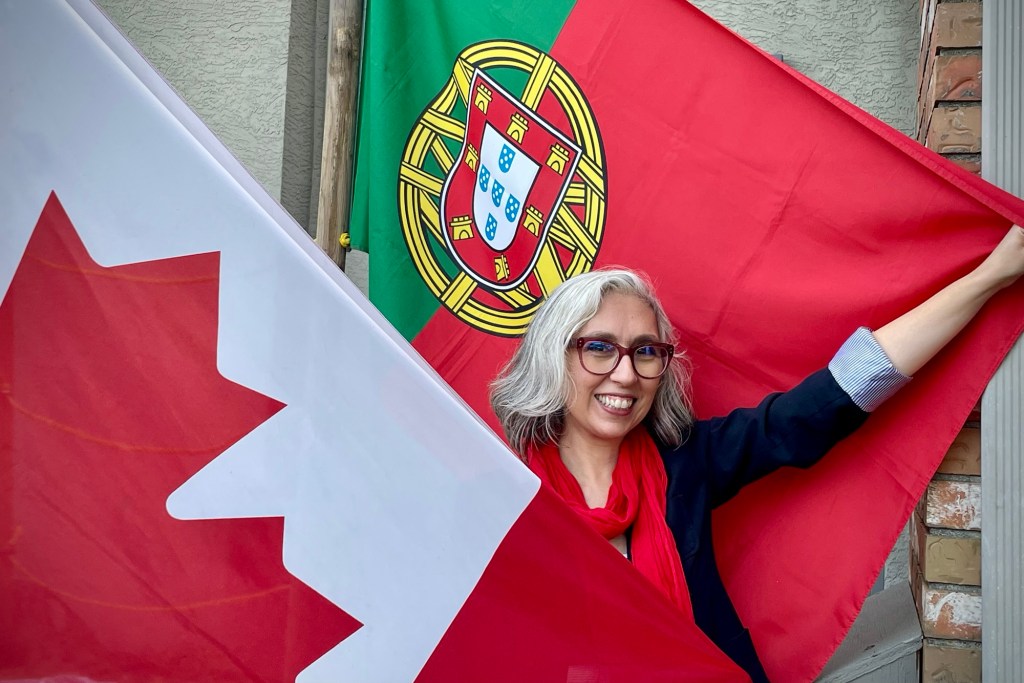 Author Sonia Nicholson with Portugal and Canada flags.